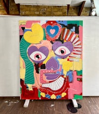 a colorful painting of a face on a wall