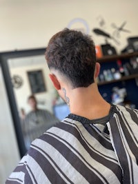 the back of a man's hair in a barber shop
