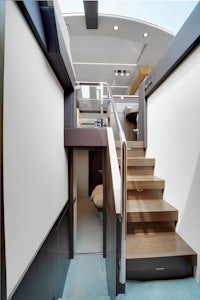 a staircase leading up to a room on a boat