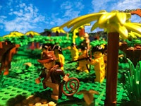 a group of lego people in a jungle