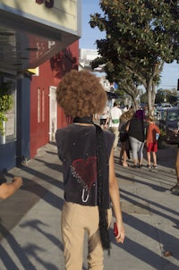 a woman with an afro