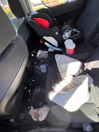 the back seat of a car with a baby in it