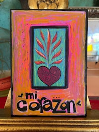 a painting of a heart with the words mi corazón on it