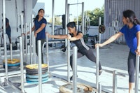 a group of women working out in a gym