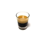 a shot of espresso on a white background