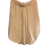 a women's tan skirt on a hanger