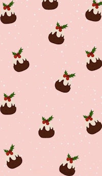 christmas puddings on a pink background