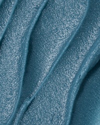 a close up of a blue textured surface