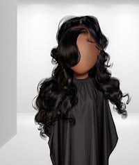a black wig with long black hair in a room