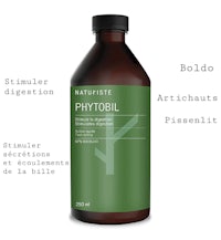 a bottle of phytooil with different ingredients