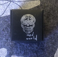 a black box with a skull on it