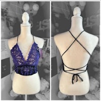 two pictures of a mannequin wearing a purple and black bra