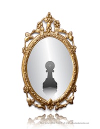 a mirror with a chess piece in it