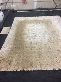 a rug that has been cleaned in a garage