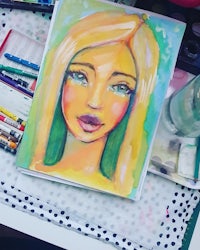 a watercolor painting of a girl with blond hair