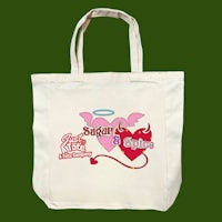 a tote bag with a heart and an angel on it