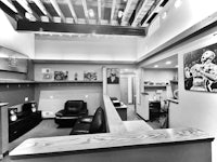 a black and white photo of a recording studio