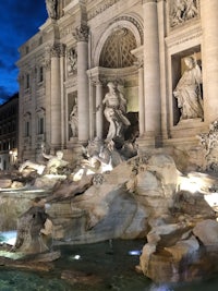 the trevi fountain in rome at night