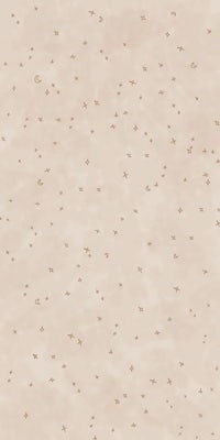 a beige background with a lot of small dots on it