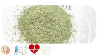 a pile of green leaves with a heart and a heart symbol