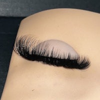 a mannequin with fake lashes on it