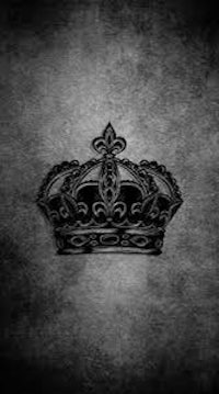 a black and white crown on a dark background