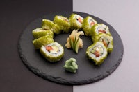 japanese sushi on a black plate