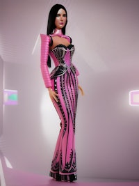 a barbie doll in a pink dress