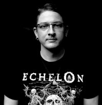 a man wearing a t - shirt with the word echelon on it