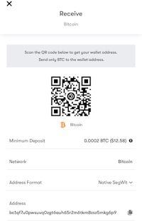 a bitcoin qr code is displayed on the screen