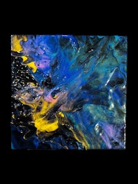 a blue and yellow painting on a black background
