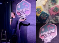 a man is on stage at the sunshine city comedy club
