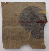 a piece of brown paper with a drawing on it