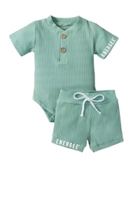 a green baby bodysuit and shorts set