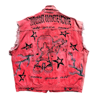 a red denim vest with a drawing on it