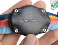 a person holding a collar with the word elevationlab on it