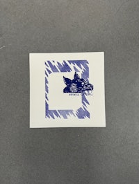 a sticker with a blue and white design on it