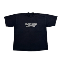 a black t - shirt with the words'happy things'on it