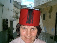 a woman wearing a red hat