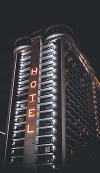 a hotel building lit up at night
