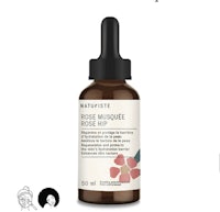 a bottle of rose mist rosehip oil on a white background