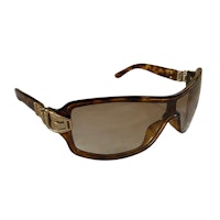 a pair of sunglasses with a brown frame and brown lenses