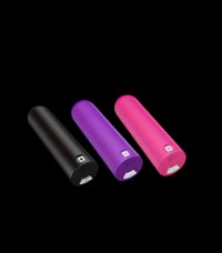 three different colored power banks on a black background