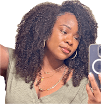 a woman is taking a selfie with her cell phone