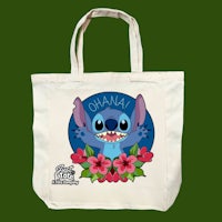 a tote bag with an image of stitch and flowers