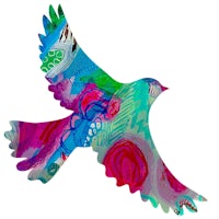 a colorful bird flying in the sky