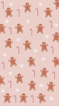 a pink christmas pattern with gingerbread men and candy canes