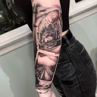a woman's sleeve tattoo with a picture of a wave