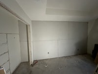 a room that is being remodeled with white walls