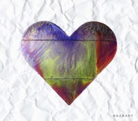 a colorful heart on a piece of crumpled paper
